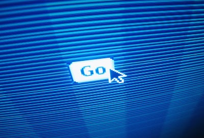 Image of computer monitor with the pointer hovering above the word 'Go' underscoring the need for project team readiness.