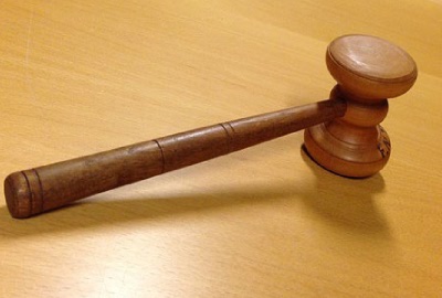 Image of gavel indicating the need to have project governance plans.
