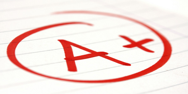 Image of report card with a grade of 'A+' signifying the need to apply lessons learned techniques to projects.