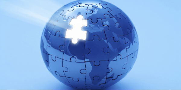 Image of globe made from puzzle pieces with one missing depicting the need to create a responsibilities framework.