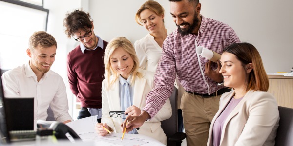 Image of a group of business people in a team participation exercise.